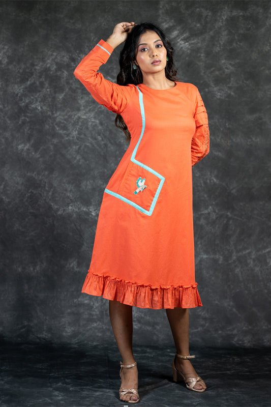 Orange mal dress with hand embroidered bird on pocket