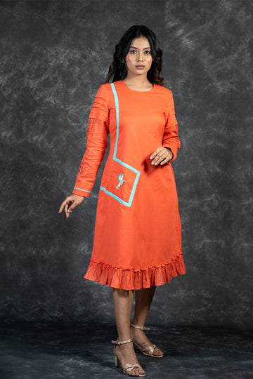 Orange mal dress with hand embroidered bird on pocket